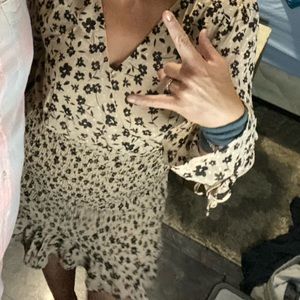 Dress by Promesa with V-neck and lining on bottom half.